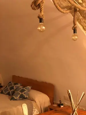 Letto o letti in una camera di Il Galletto Viola, luxury room & suite