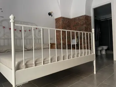 Letto o letti in una camera di Catania Centro Storico