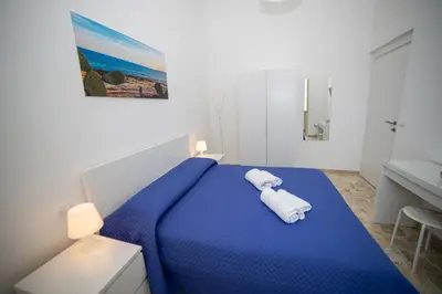 Letto o letti in una camera di Boma Home
