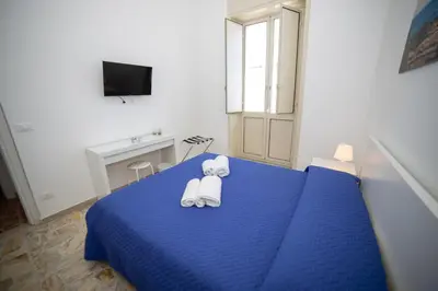 Letto o letti in una camera di Boma Home