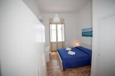 Letto o letti in una camera di Boma Home