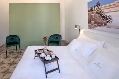 Letto o letti in una camera di Sikelia Suites