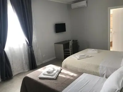 Letto o letti in una camera di Borgo Palombaio Home