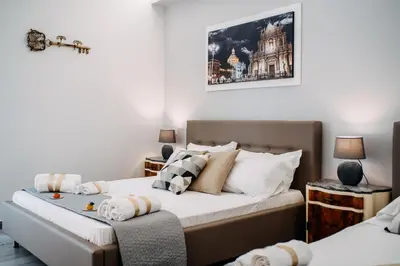 Letto o letti in una camera di B&B Stramondo