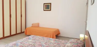 Letto o letti in una camera di Il Terrazzo di Apollo