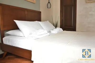 Letto o letti in una camera di Casa Bellomo Ortigia