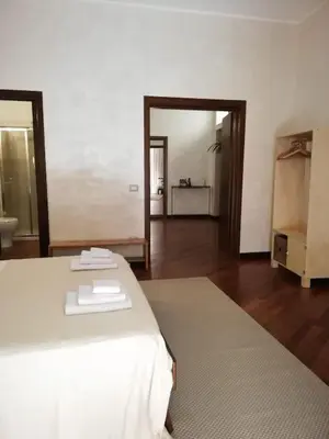 Letto o letti in una camera di Casa Bellomo Ortigia