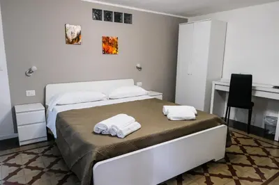 Letto o letti in una camera di Antica Dimora Maravigna