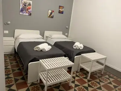 Letto o letti in una camera di Antica Dimora Maravigna