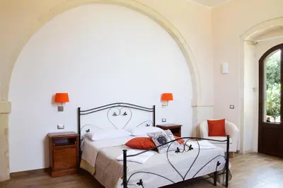 Letto o letti in una camera di Antico Casale Benalì