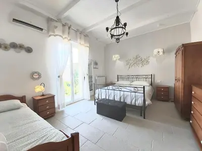 Letto o letti in una camera di Amononna