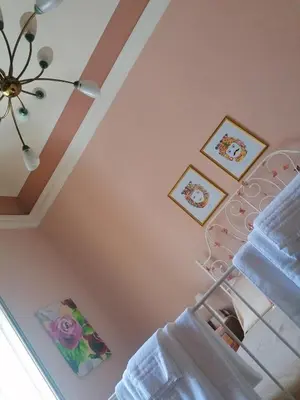 Letto o letti in una camera di Diletta Oasi