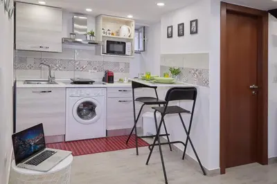 Cucina o angolo cottura di La Palma Loft Located in the Heart of Catania