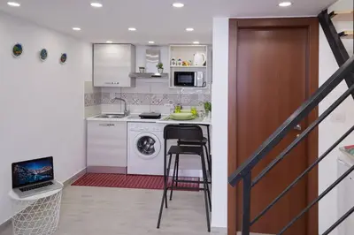 Cucina o angolo cottura di La Palma Loft Located in the Heart of Catania