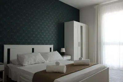 Letto o letti in una camera di Residence La Perla Marzamemi