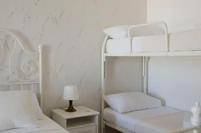 Letto o letti in una camera di Residence La Perla Marzamemi
