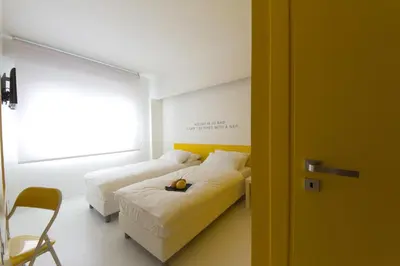 Letto o letti in una camera di Bed 'n Design