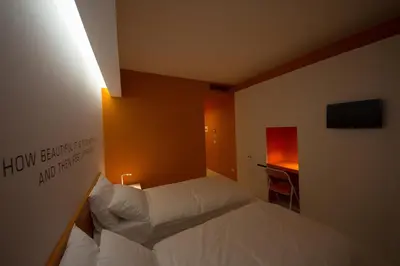 Letto o letti in una camera di Bed 'n Design