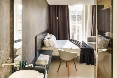 Letto o letti in una camera di Meo Design Suites & Spa
