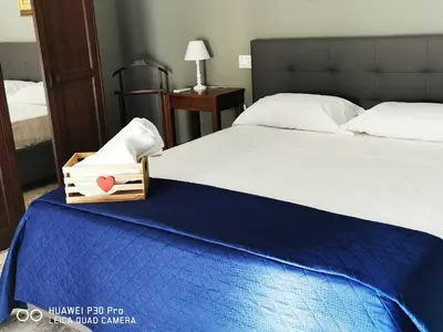 Letto o letti in una camera di L'ARENA ROOM