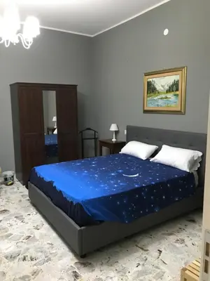 Letto o letti in una camera di L'ARENA ROOM