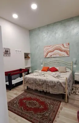 Letto o letti in una camera di Sabbia del Sud Affittacamere