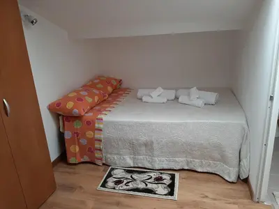 Letto o letti in una camera di Sabbia del Sud Affittacamere