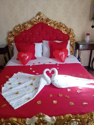 Letto o letti in una camera di B&B Sotto gli archi