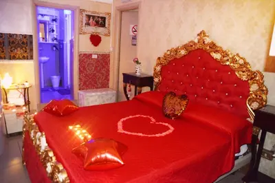 Letto o letti in una camera di B&B Sotto gli archi