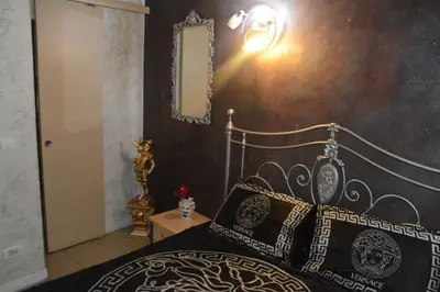 Letto o letti in una camera di B&B Sotto gli archi