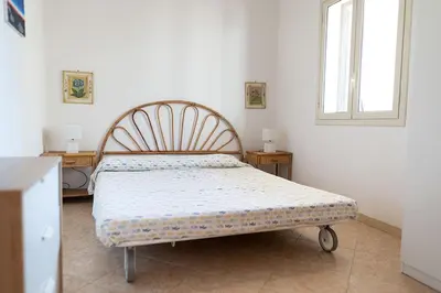 Letto o letti in una camera di Casa malacala