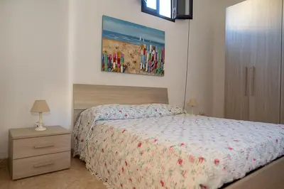 Letto o letti in una camera di Casa malacala