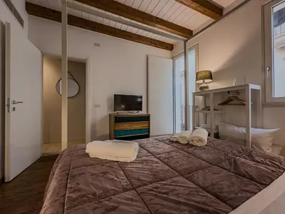 Letto o letti in una camera di Maison Rouge Ortigia