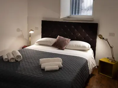 Letto o letti in una camera di Maison Rouge Ortigia