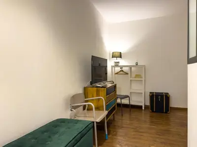 TV o dispositivi per l'intrattenimento presso Maison Rouge Ortigia