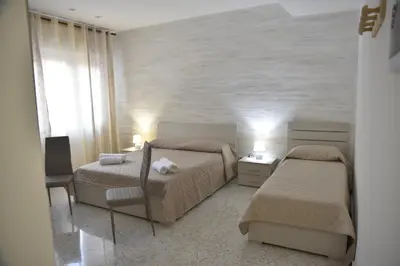 Letto o letti in una camera di B&B Stella