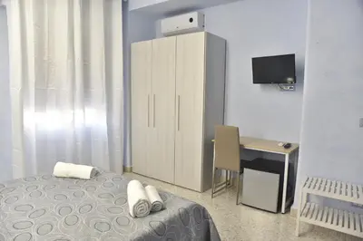 Letto o letti in una camera di B&B Stella