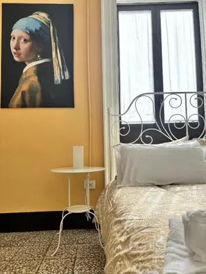 Letto o letti in una camera di Il Teatro Rooms