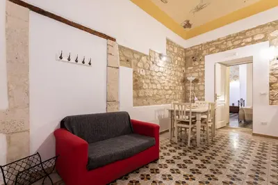 Area soggiorno di Salomone Apartments I by Wonderful Italy