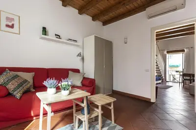 Area soggiorno di Salomone Apartments I by Wonderful Italy