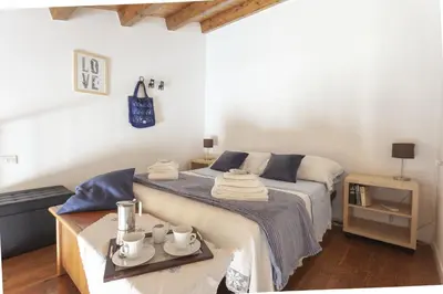 Letto o letti in una camera di Salomone Apartments I by Wonderful Italy