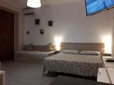 Letto o letti in una camera di Fontanarossa Airport Sleep and Travel