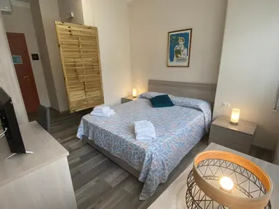 Letto o letti in una camera di R&B Santa Nicolella