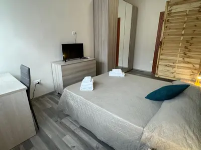Letto o letti in una camera di R&B Santa Nicolella