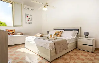 Letto o letti in una camera di Villa Natalia