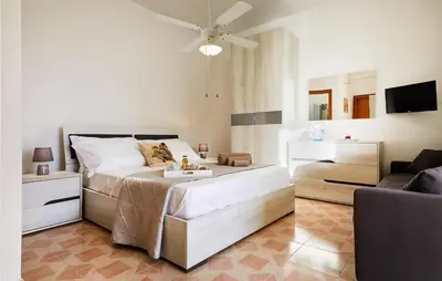 Letto o letti in una camera di Villa Natalia
