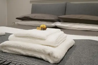 Letto o letti in una camera di 7 BLU Casa vacanze con idromassaggio