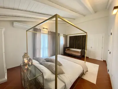 Letto o letti in una camera di La Gemmazza di Monasteri