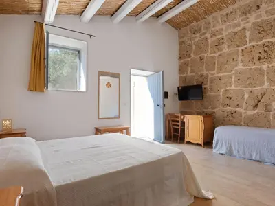 Letto o letti in una camera di Farmhouse in Noto with Pool and Garden