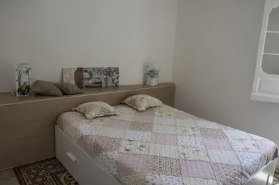 Letto o letti in una camera di Parva Domus Intera casa indipendente in centro